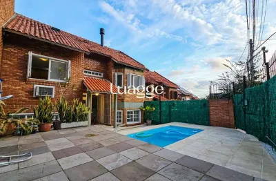 Casa na vila conceição, 3 dormitórios, 1 suíte, churrasqueira, lareira, 4 vagas, piscina aquecida e vista perene para o rio.