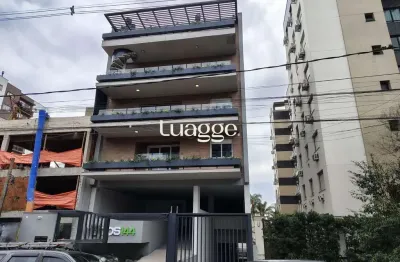 Apartamento garden de 2 dormitórios, 1 suíte e 2 vagas de garagem.
