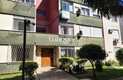 Apartamento de 2 dormitórios, living, cozinha, área de serviço e banheiro social.