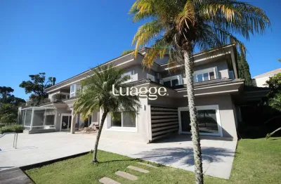 Casa alto padrão em condomínio fechado - 4 suítes, vista panorâmica