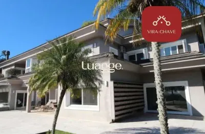 Casa alto padrão em condomínio fechado - 4 suítes, vista panorâmica