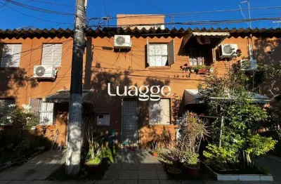 Casa em condomínio fechado com 3 quartos à venda na Rua Mura, 425, Guarujá, Porto Alegre