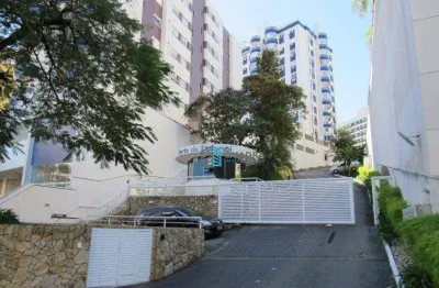 Amplo apartamento com dois quartos e sacada com churrasqueira