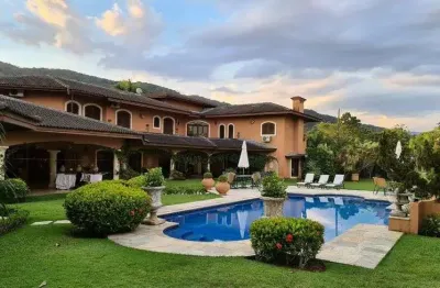 Casa em condomínio fechado com 6 quartos à venda na Avenida Kensei Tamayose, 231, Jardim Acapulco, Guarujá