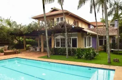 Casa de condomínio para venda com 623 metros quadrados com 6 quartos