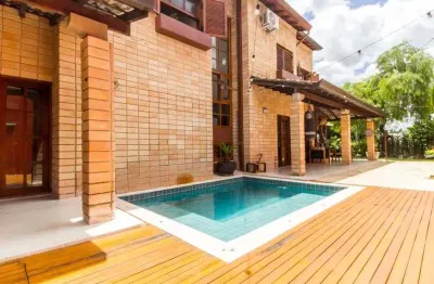 Casa estilo praia à venda no condomínio alphaville 9 em santana de parnaíba - sp