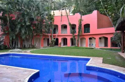 Casa de condomínio para venda possui 415 metros quadrados com 6 quartos