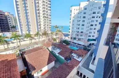 Apartamento à beira-mar com sacada e acabamento de primeira qualidade.