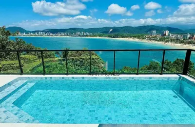 Casa nova com vista total para o mar no condomínio península na praia da enseada.