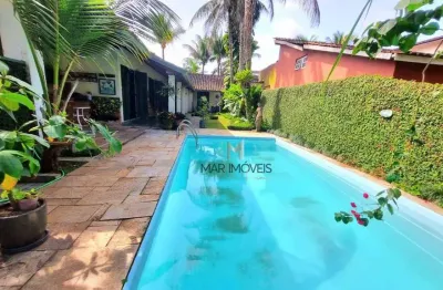 Casa térrea em condomínio fechado de alto padrão na região da praia de pernambuco no guarujá!