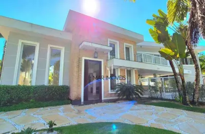 Linda casa em condomínio de alto padrão na região da praia de pernambuco no guarujá!
