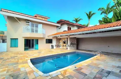 Casa em condomínio fechado com 4 suítes em excelente localização!