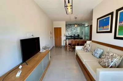 Apartamento totalmente reformado á venda na praia da enseada /mar imóveis prime.