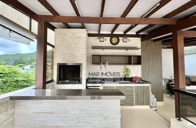 Cobertura reformada á venda na praia da enseada/mar imóveis prime.