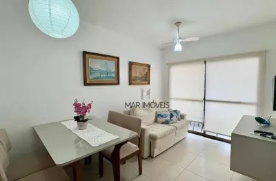 Apartamento conservado e reformado á venda na praia da enseada/mar imóveis prime.