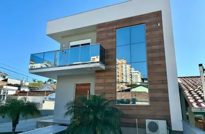 Casa com 3 quartos à venda na rua nossa senhora do rosário, 306, jardim atlântico, florianópolis por r$ 1.850.000
