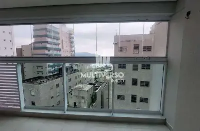 Lindo apto 2 dorm frente praia, andar alto, com varanda mobiliavel e armarios embutidos