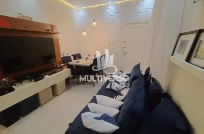 O2 dormitórios sendo 01 suíte, móveis planejador, ar condicionado, embaré, frente praia r$480.000,00