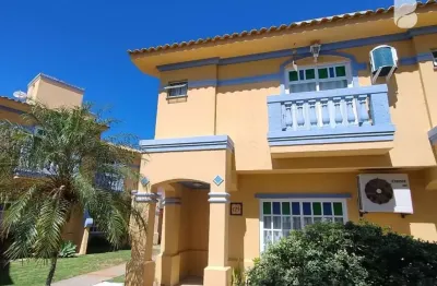 Casa em condomínio fechado com 3 quartos à venda na do ipê roxo, 40, praia de palmas, governador celso ramos por r$ 2.100.000