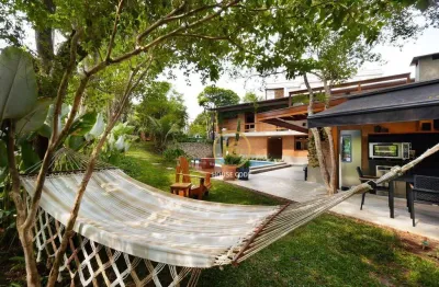 Casa raízes com 5 quartos à venda, 695 m² por r$ 6.550.000 - alphaville residencial 4 - santana de parnaíba/sp