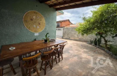 Sobrado com 3 dormitórios à venda, 126 m² por R$ 1.200.000,00 - Praia das Palmeiras - Caraguatatuba/SP