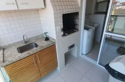 Apartamento com varanda gourmet e vista panorâmica na praia grande.
