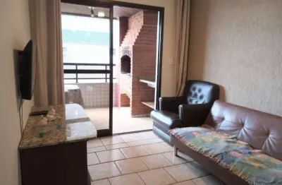 Apartamento na praia grande apenas 50 metros do mar.