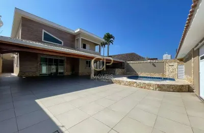 Casa isolada alto padrão com 5 suítes a 300 metros da praia no balneário florida