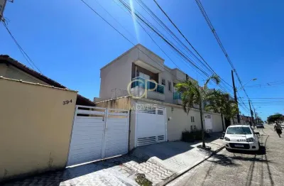 Casa geminada a 350 metros da praia no bairro maracanã em praia grande.