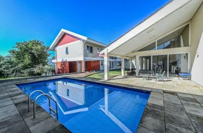 Casa com 4 quartos à venda na Rua Paulo Madureira Coelho, 480, Alto Petrópolis, Porto Alegre