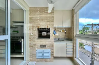 Apartamento no guarujá, enseada, 2 quartos, sala para 2 ambientes e varanda gourmet - mercuri imóveis - imobiliária no guarujá