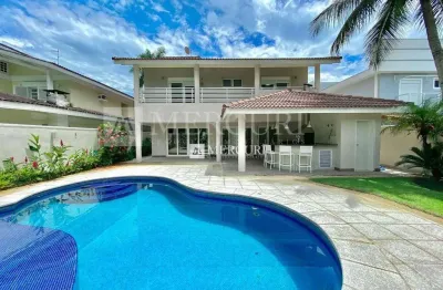 Casa no guarujá, condomínio fechado, jardim pernambuco, 5 quartos, 5 suítes, piscina e churraqueira  - mercuri imóveis - imobiliária guarujá