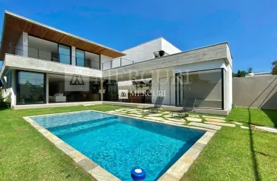 Casa de luxo com 5 suítes e design exclusivo no jardim acapulco