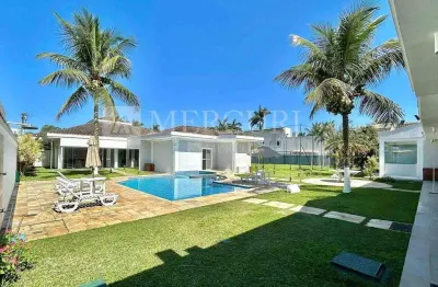 Luxuosa casa com 7 suítes no jardim acapulco, guarujá - mercuri imóveis - imobiliária no guarujá