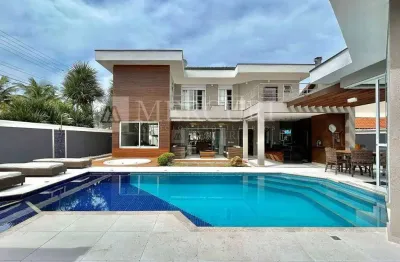 Casa no guarujá, jardim acapulco, condomínio fechado, 5 quartos, 5 suíte e sacada - mercuri imóveis – imobiliária no guarujá