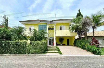 Confortável residência com 4 suítes e área de lazer no condomínio acapulco  - mercuri imóveis - imobiliária no guarujá