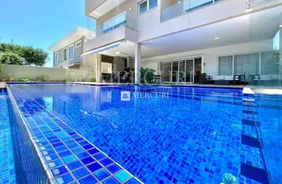 Casa em condomínio fechado no guarujá, enseada, com piscina e área gourmet, com 6 suítes, mercuri imóveis - imobiliaria no guarujá.
