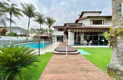 Luxuosa residência com 4 suítes e ampla área de lazer no condomínio jardim acapulco