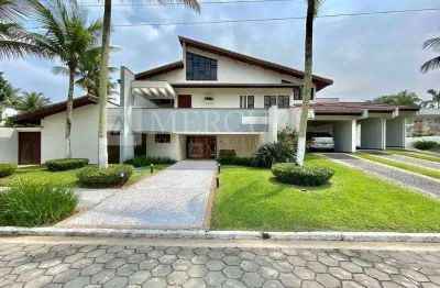 Luxuosa residência com 4 suítes e ampla área de lazer no condomínio jardim acapulco - mercuri imóveis - imobiliária no guarujá