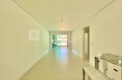 Apartamento no guarujá, enseada, 3 quartos sendo 2 suítes, sala para 2 ambientes e varanda goumert - mercuri imóveis - imobiliária no guarujá