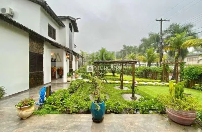 Casa no guarujá, jardim pernambuco, condomínio fechado, 5 quartos, sendo 3 suítes, piscina e churrasqueira - mercuri imóveis - imobiliária no guarujá