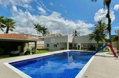 Residência de alto padrão com 4 quartos e piscina no condomínio jardim acapulco - mercuri imóveis - imobiliária no guarujá