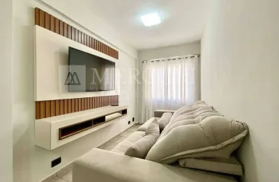 Apartamento no guarujá, enseada, 2 quartos e sala com 2 ambientes - mercuri imóveis - imobiliária no guarujá