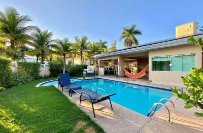 Casa no guarujá, condomínio fechado, jardim pernambuco, 4 quartos, sendo 1 suíte master e piscina - mercuri imóveis - imobiliária no guarujá