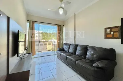 Apartamento no guarujá, enseada, 2 quartos e sacada com vista parcial do mar - mercuri imóveis - imobiliária no guarujá