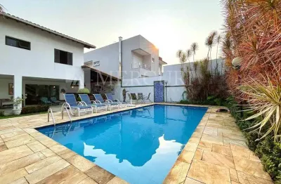 Casa no guarujá, jardim acapulco, condomínio fechado, 6 quartos, sendo 5 suíte e varanda gourmet - mercuri imóveis - imobiliária no guarujá