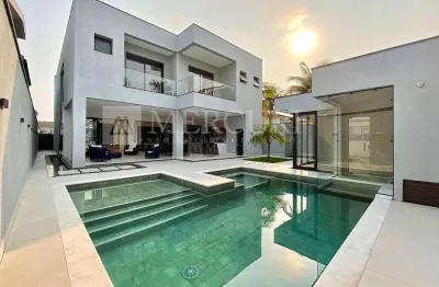 Casa no guarujá, condomínio fechado, jardim acapulco e 5 suítes - mercuri imóveis - imobiliária no guarujá