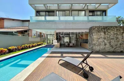 Casa no guarujá, jardim acapulco, condomínio fechado e luxuosa residência com 5 suítes e jacuzzi - mercuri imóveis - imobiliária no guarujá