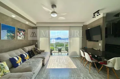 Apartamento no guarujá, enseada, duplex, 2 quartos, sala integrada e sacada com vista para o mar- mercuri imóveis - imobiliária no guarujá