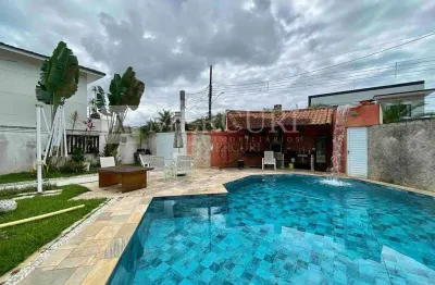 Casa no guarujá, jardim acapulco, 4 suítes, sacada e espaço gourmet com piscina - mercuri imóveis - imobiliária no guarujá